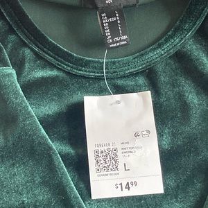 Make a statement with this piece, high shine velour shirt